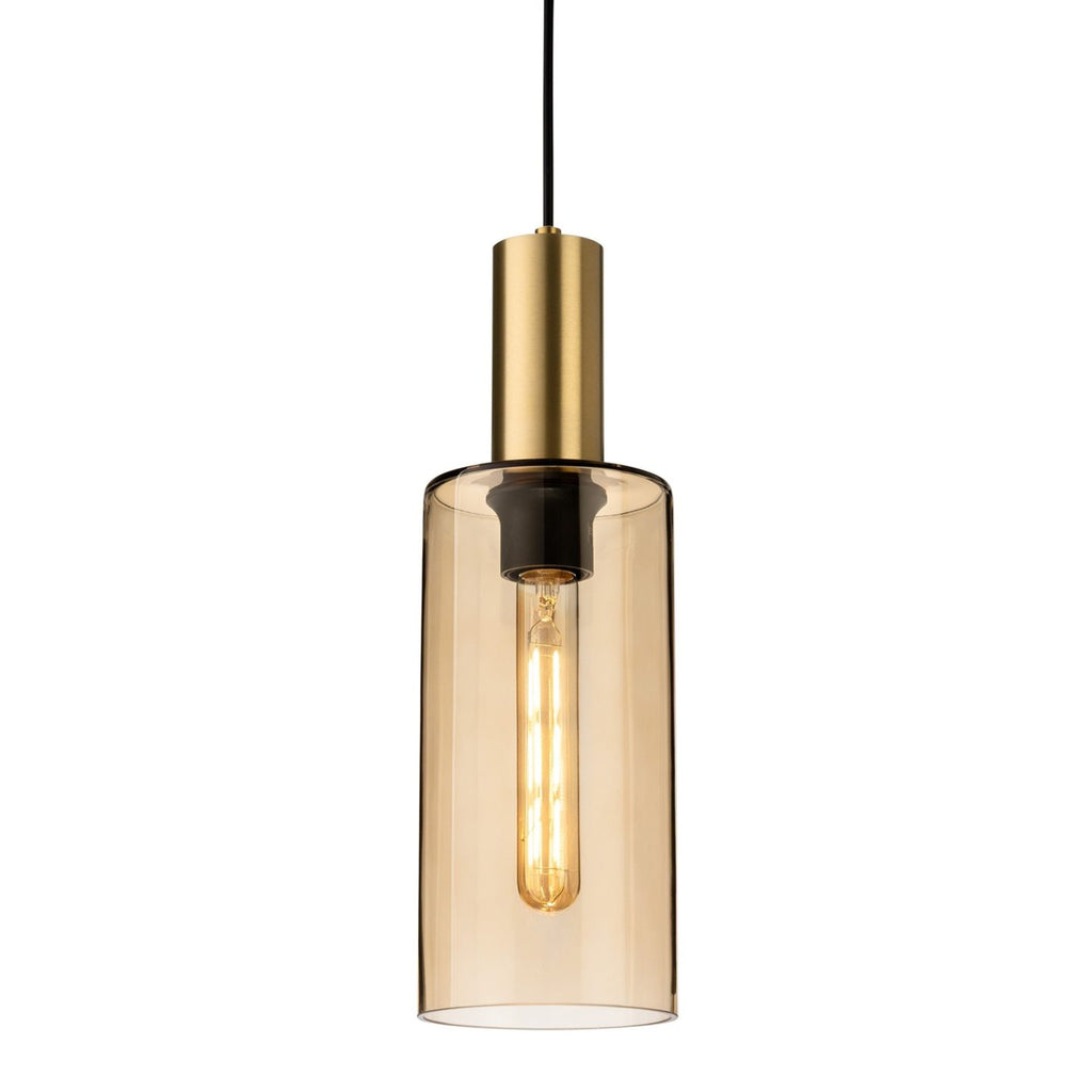 Arden Smoked Amber Glass Pendant in satin brass, straight-on view with the filament bulb lit inside the amber glass cylinder