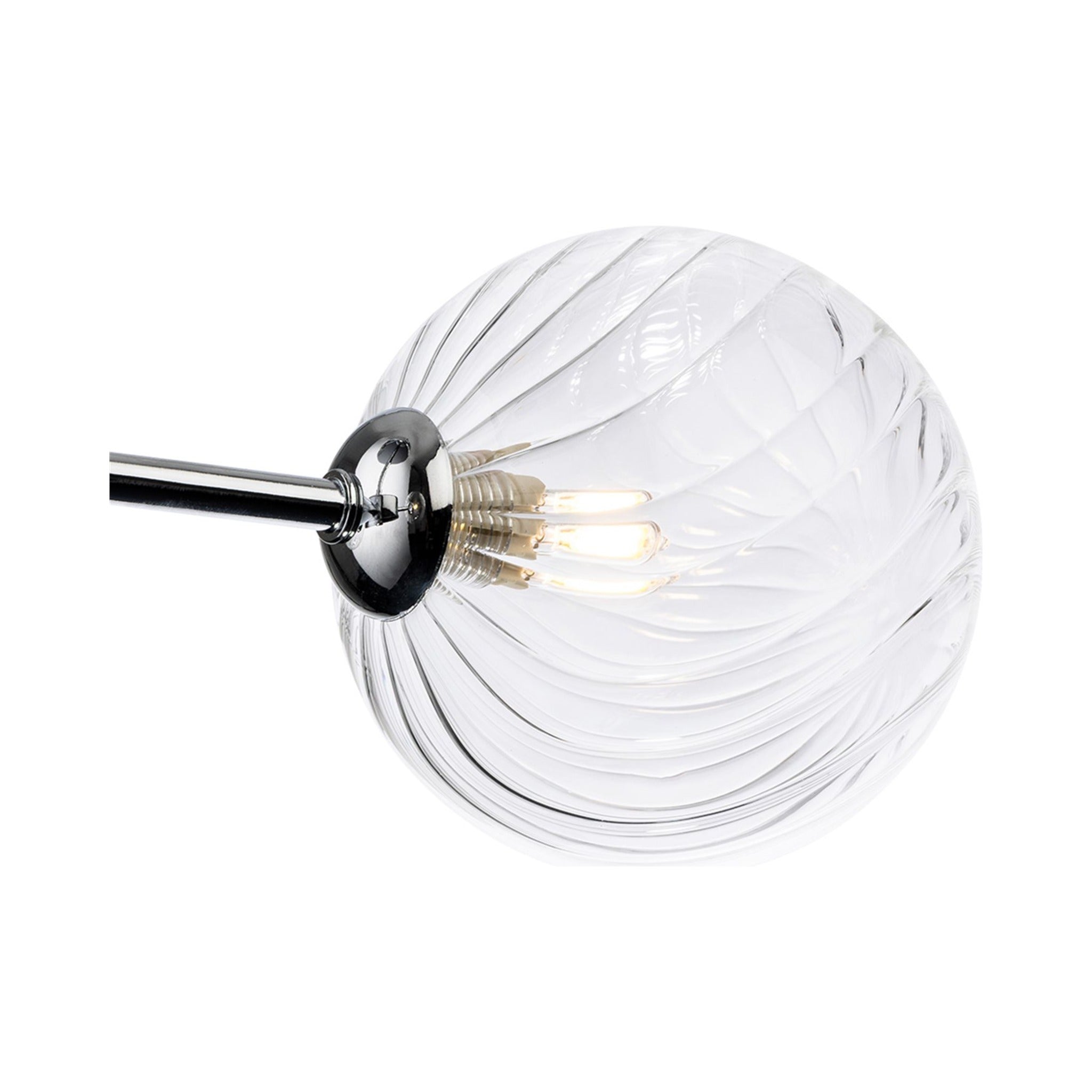 Close-up of the swirled clear glass globe and chrome arm on the Ashby Semi-Flush Ceiling Light