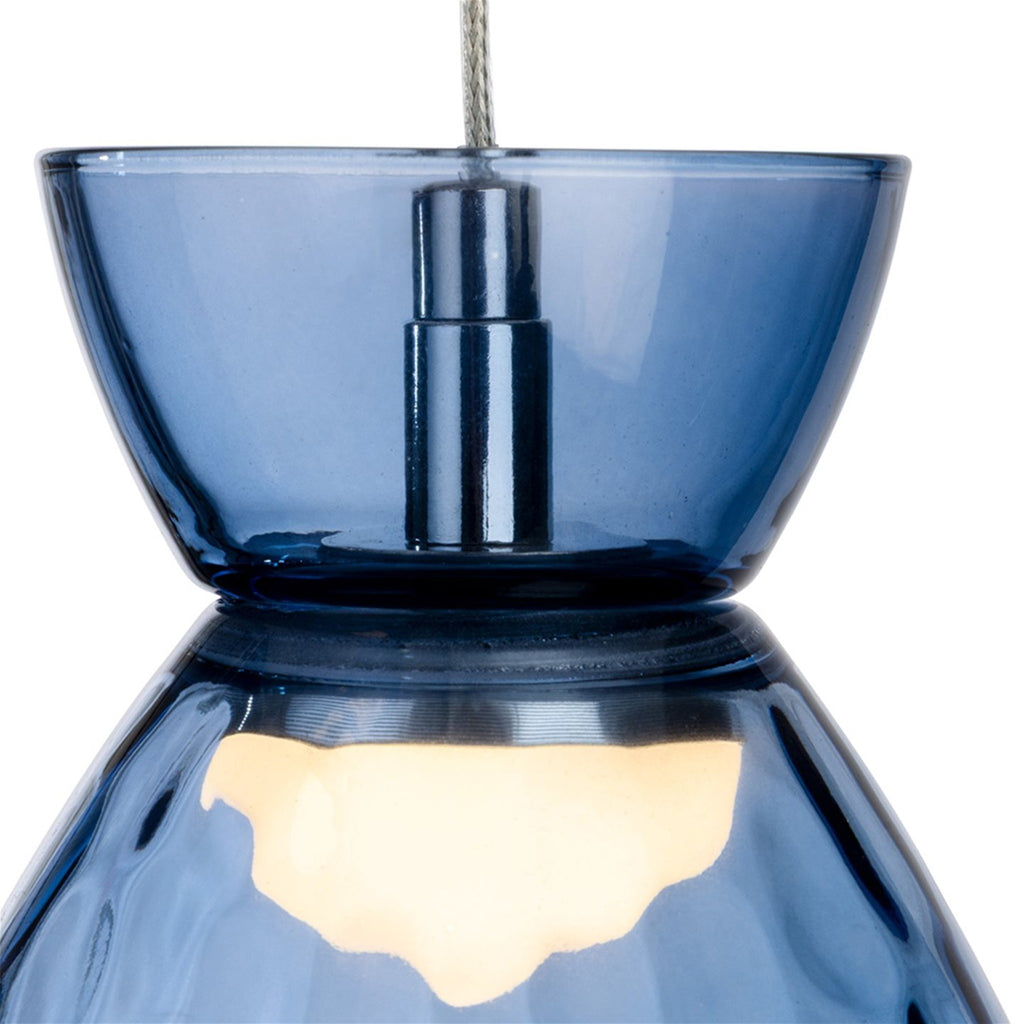 Close detail of the two-part blue dimpled glass shade and chrome fitting
