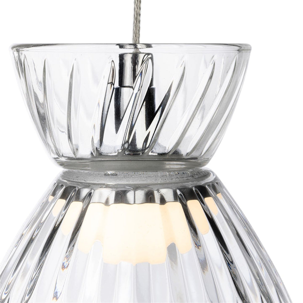 Close detail of the two-part clear fluted glass shade and chrome fitting