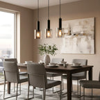 Elden Smoked Glass 3 Light Bar Pendant in black hanging above a dining table