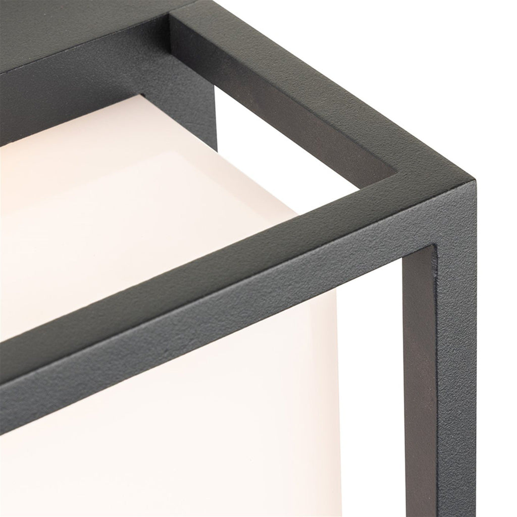 Close-up detail of the Elgin Framed Panel LED Outdoor Wall Light, showing the graphite frame edge and opal diffuser