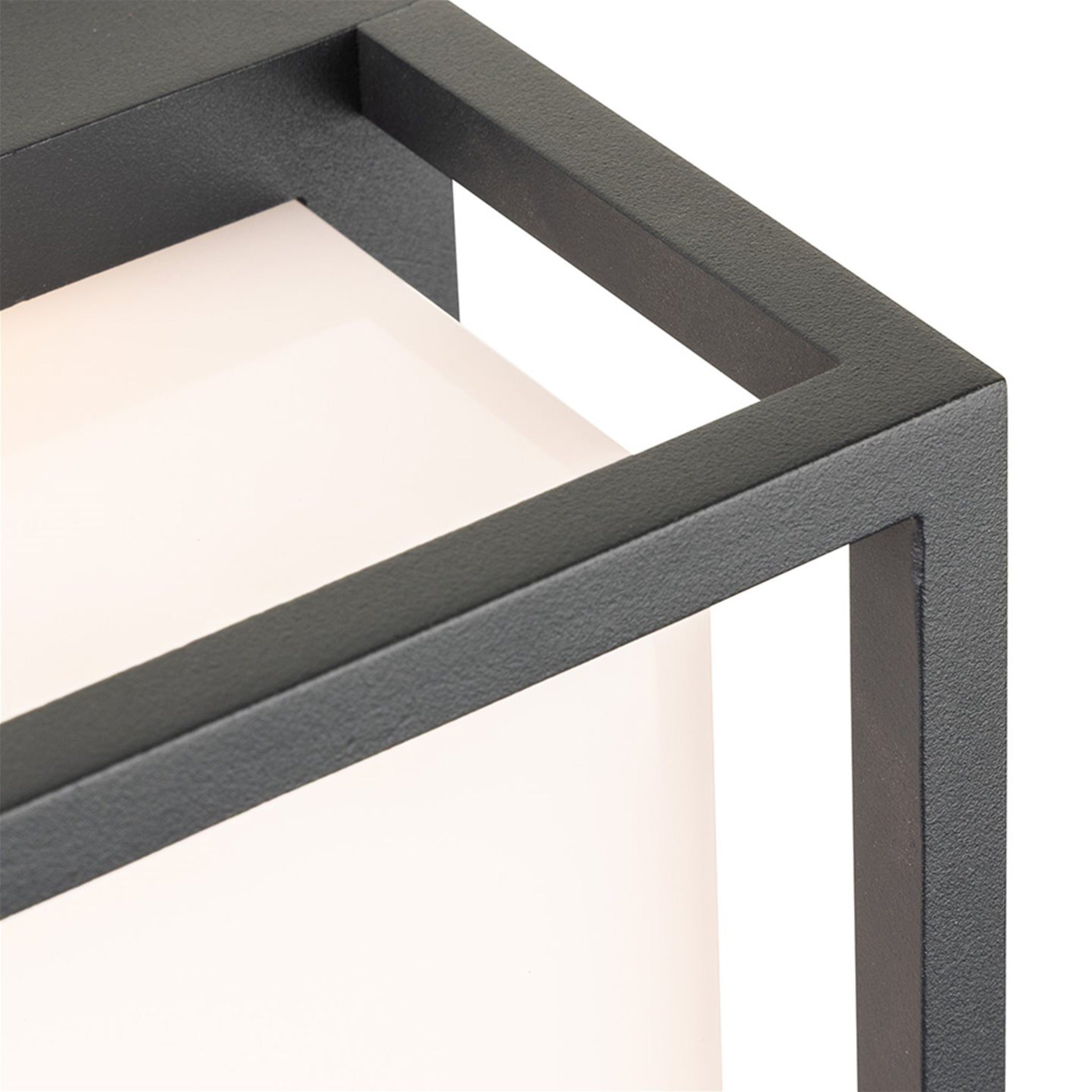 Close-up detail of the Elgin Framed Panel LED Outdoor Wall Light, showing the graphite frame edge and opal diffuser