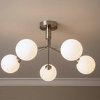 Ellis 5 Globe Semi-Flush Ceiling Light in brushed steel fitted to a living room ceiling