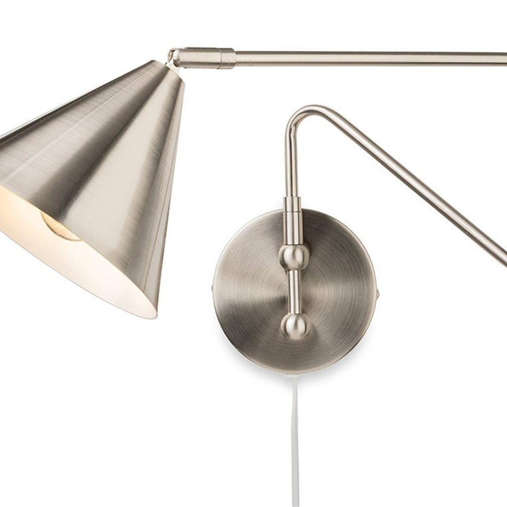 Fenwick Swing Arm Plug-In Wall Light in brushed steel, angled close view of the cone shade and backplate