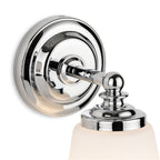 Close-up of the stepped chrome backplate and arm on the Hadley Opal Glass Bathroom Wall Light
