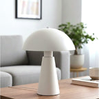 Halden Dome Table Lamp in satin white on a wooden console table