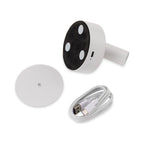 Kelby Magnetic Rechargeable LED Spotlight in white with its magnetic wall plate and USB-C charging cable