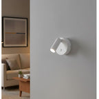 Kelby Magnetic Rechargeable LED Spotlight in white, mounted on a living room wall