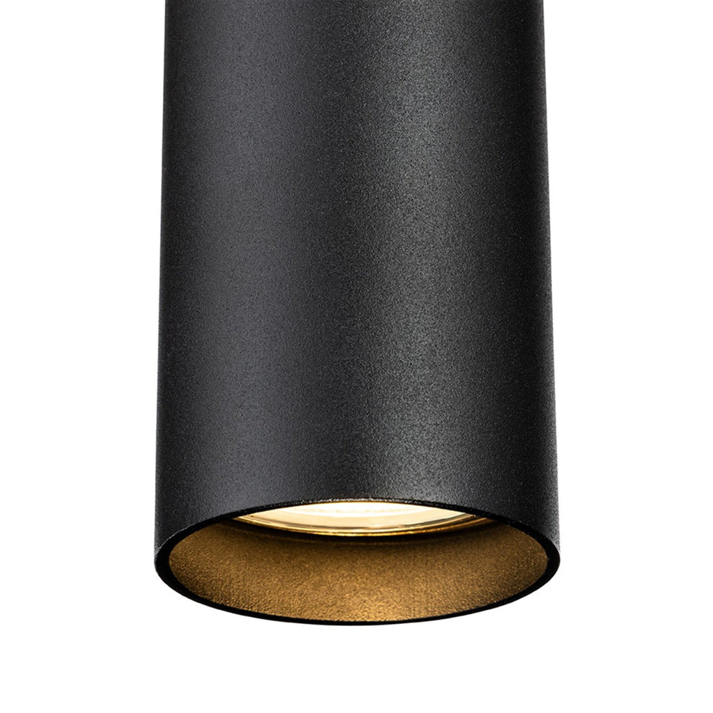 Close-up of the black Kelso pendant showing the brass-toned reflector inside