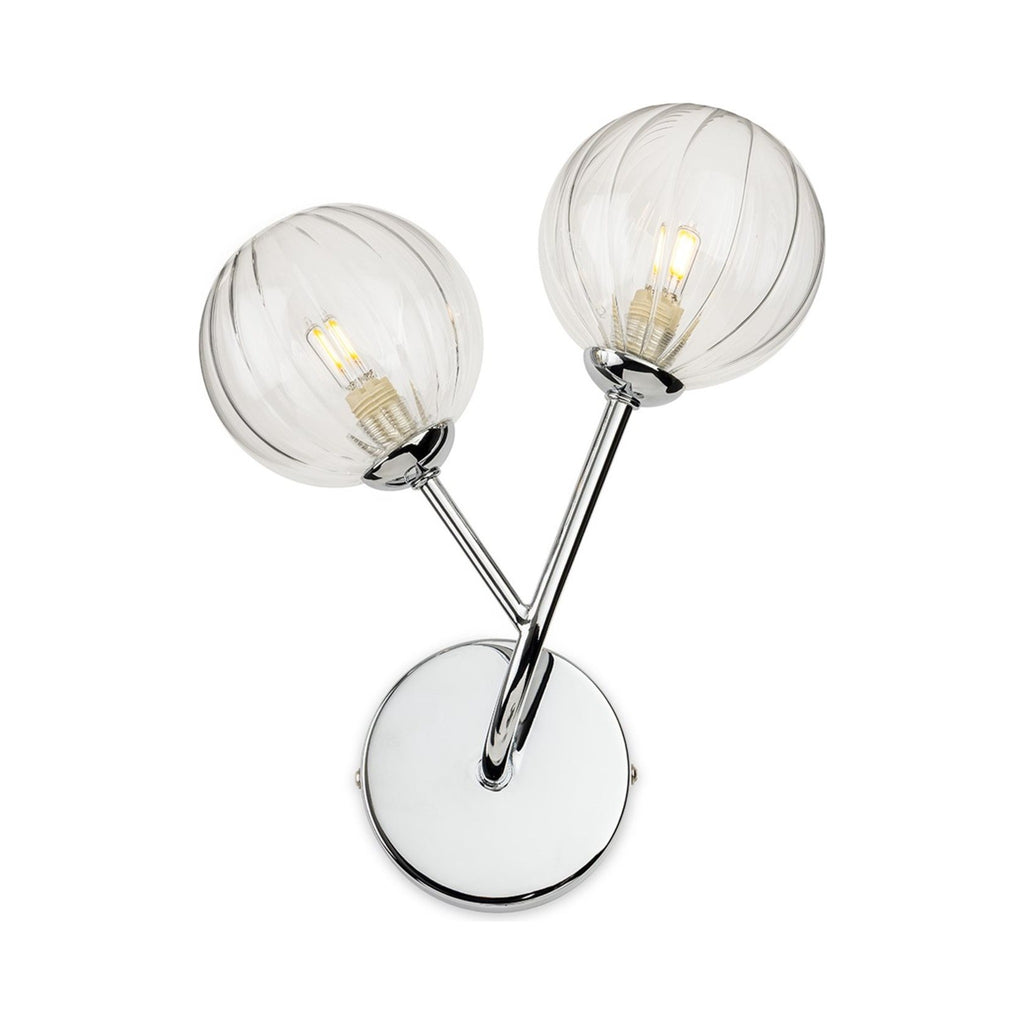Lyra Twin Globe Wall Light in chrome, angled view showing the round backplate