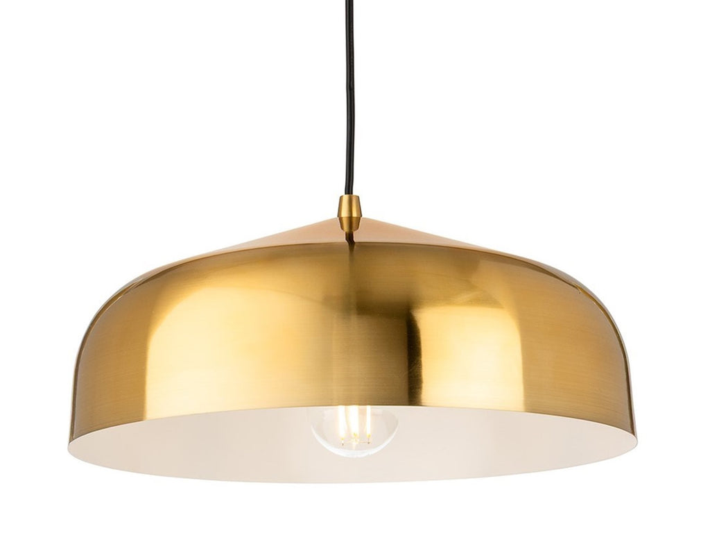 Marlow Wide Dome Pendant in brushed brass, lit, seen straight on with the white-painted interior visible