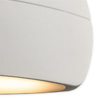 Close-up of the textured white finish and downward light output