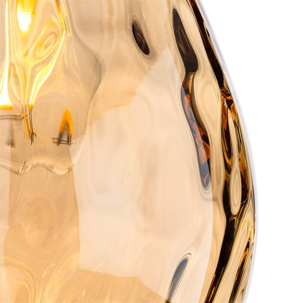Close detail of the rippled amber glass shade on the Orla Teardrop Glass Pendant