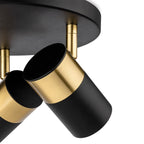 Close view of the Renn 3 Light GU10 Flush Ceiling Spotlight heads showing the brushed brass collars and black barrels