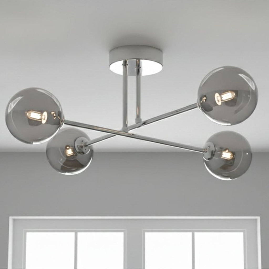 Ripley Glass Globe 4 Light Semi-Flush Ceiling Light in chrome, lit on a living room ceiling