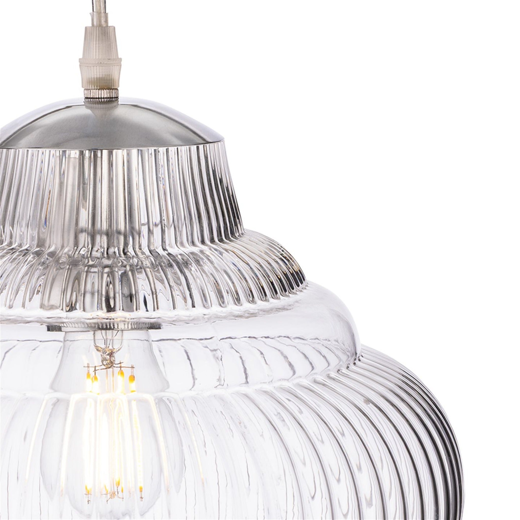 Close detail of the Selby Fluted Glass Pendant's ribbed clear glass and chrome fittings
