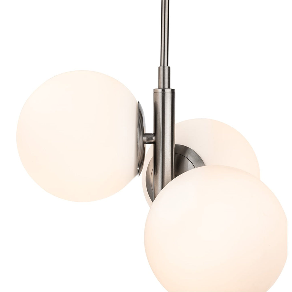 Selby Staggered Opal Globe 3 Light Pendant in brushed steel, close view of the steel stem and globe fixings